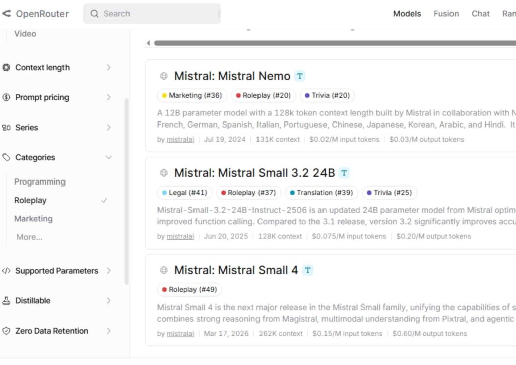 creenshot of the OpenRouter model directory showing roleplay-focused AI models filtered by category. The interface displays Mistral Nemo, Mistral Small 3.2 24B, and Mistral Small 4 with rankings, context lengths, pricing details, and roleplay tags. This view demonstrates how Janitor AI users can explore and select compatible language models through OpenRouter for chatbot conversations and immersive roleplay experiences.