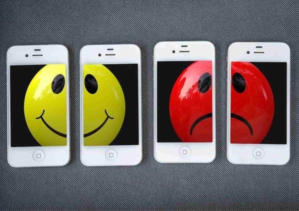 Concept image of contrasting emotions on mobile screens to represent Jasper AI vs Copy AI comparison.