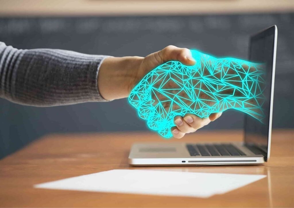 Cybersecurity concept showing digital handshake between human and AI through laptop